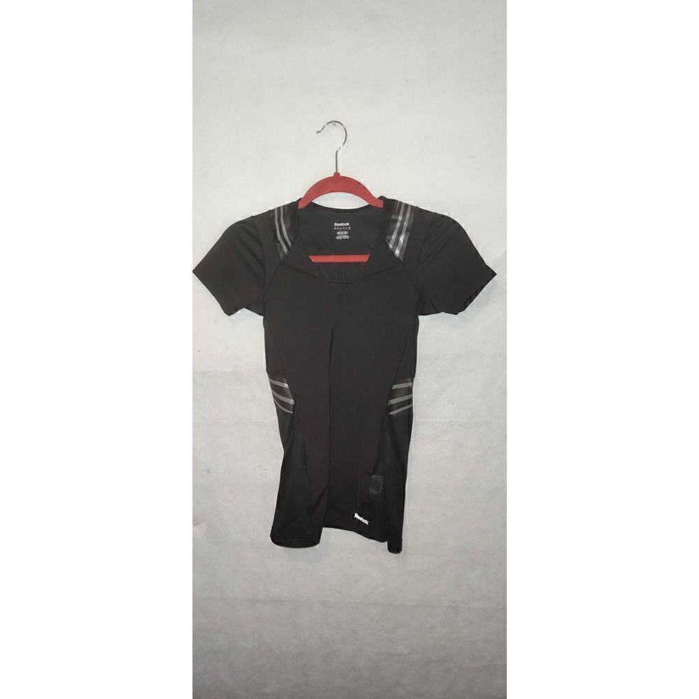 Reebok Easytone Compression Shirt Women’s size medium. Black w silver stripes.